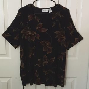 Kathy Ireland Plus size X black shirt with flower pattern.